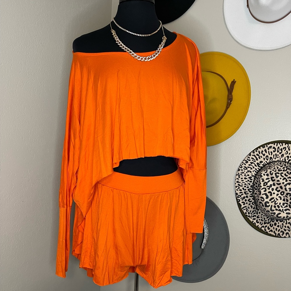Going on vacation? Perfect vaca outfit.. super cute comfy bright Orange 2piece